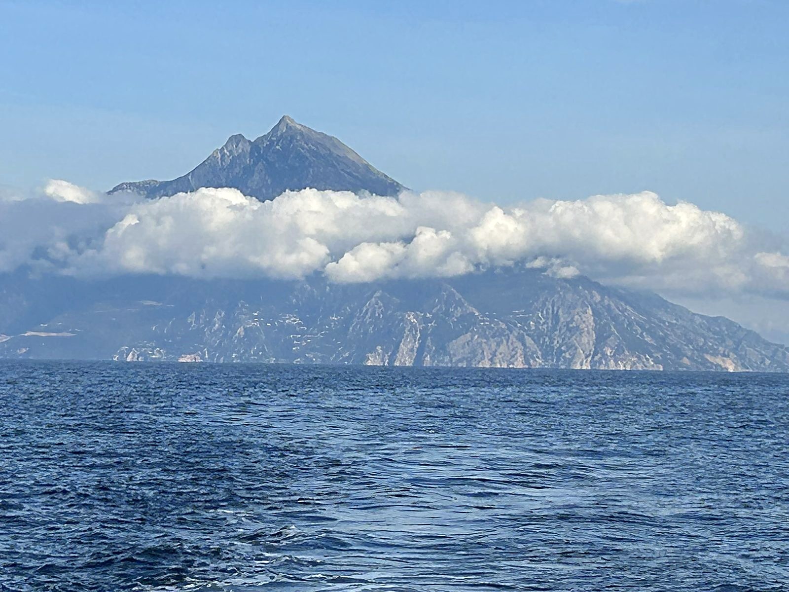 Mount Athos rising from the sea, seen from the gulf on a Nimbus T11 cruise