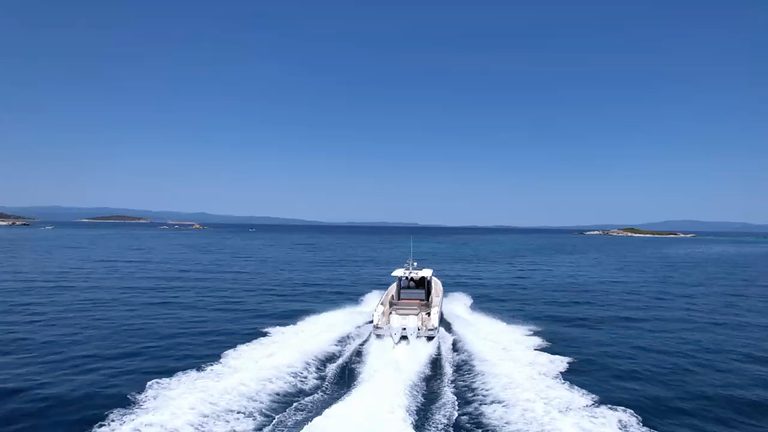 The Nimbus T11 under way between the islands off Sithonia